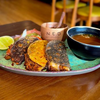 Oro by Nixta signature dishes PescadillasCochinitaMole de Olla
